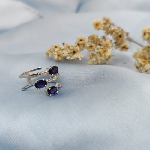 three natural Iolite gemstones