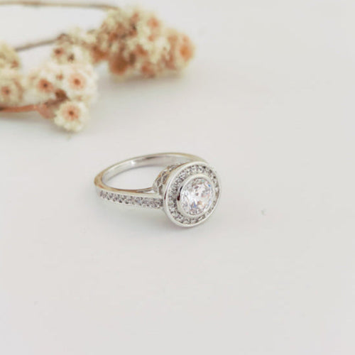 round-cut white center stone ring