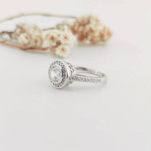 round-cut white center stone ring
