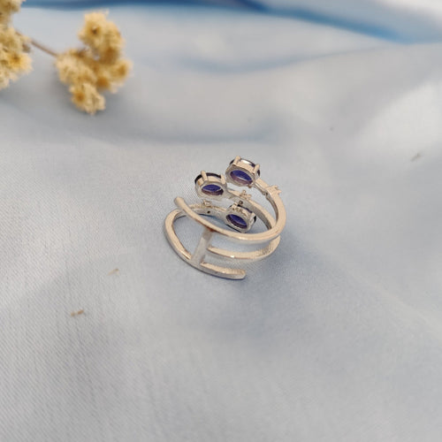 three natural Iolite gemstones